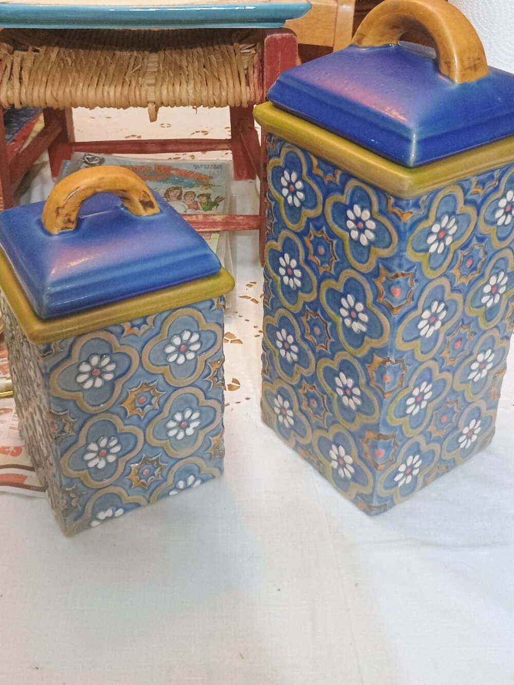 2 blue and gold, assorted sizes lidded canisters